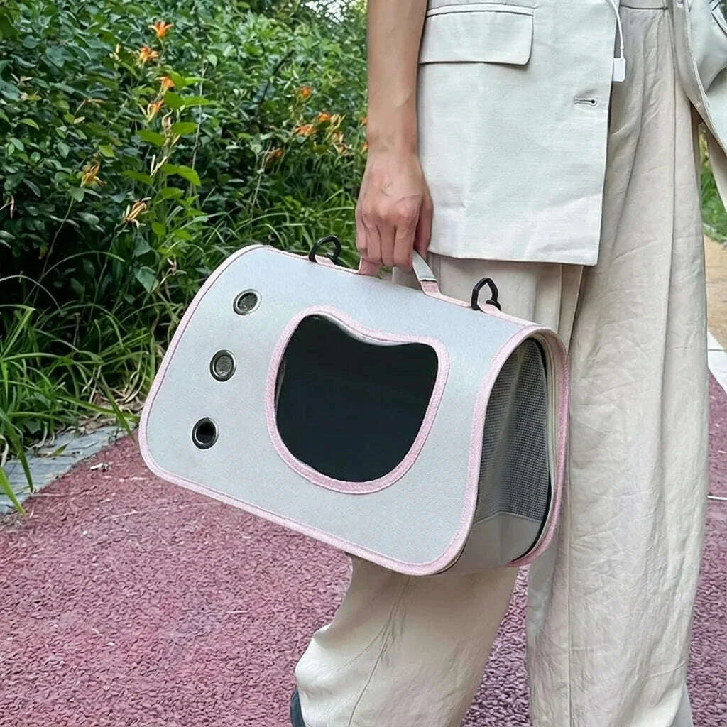 Panier de transport pour chat pas cher, vue de la face avant et des œillets
