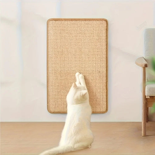 Cat scratching the wall-mounted sisal scratching post