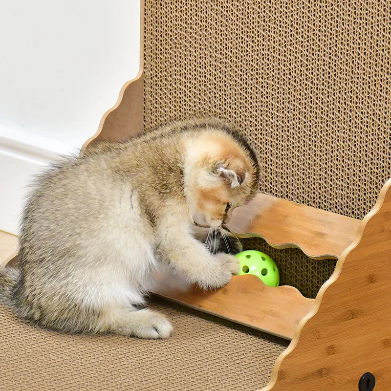 Cat playing with the scratching post's built-in ball