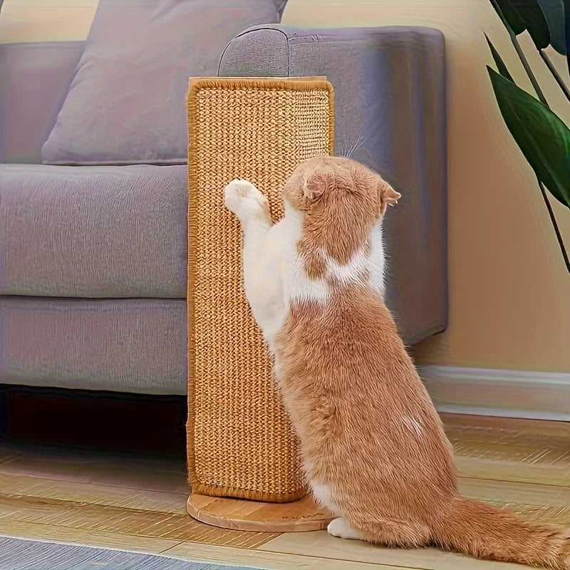 Cat scratching the sisal mat attached to the corner of a sofa